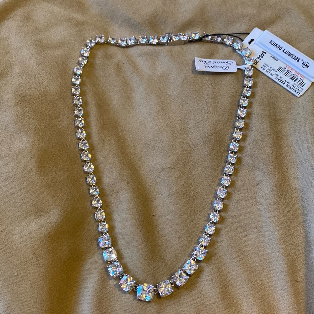 Beautiful KJL necklace signed cubic zirconia in graduating stones.